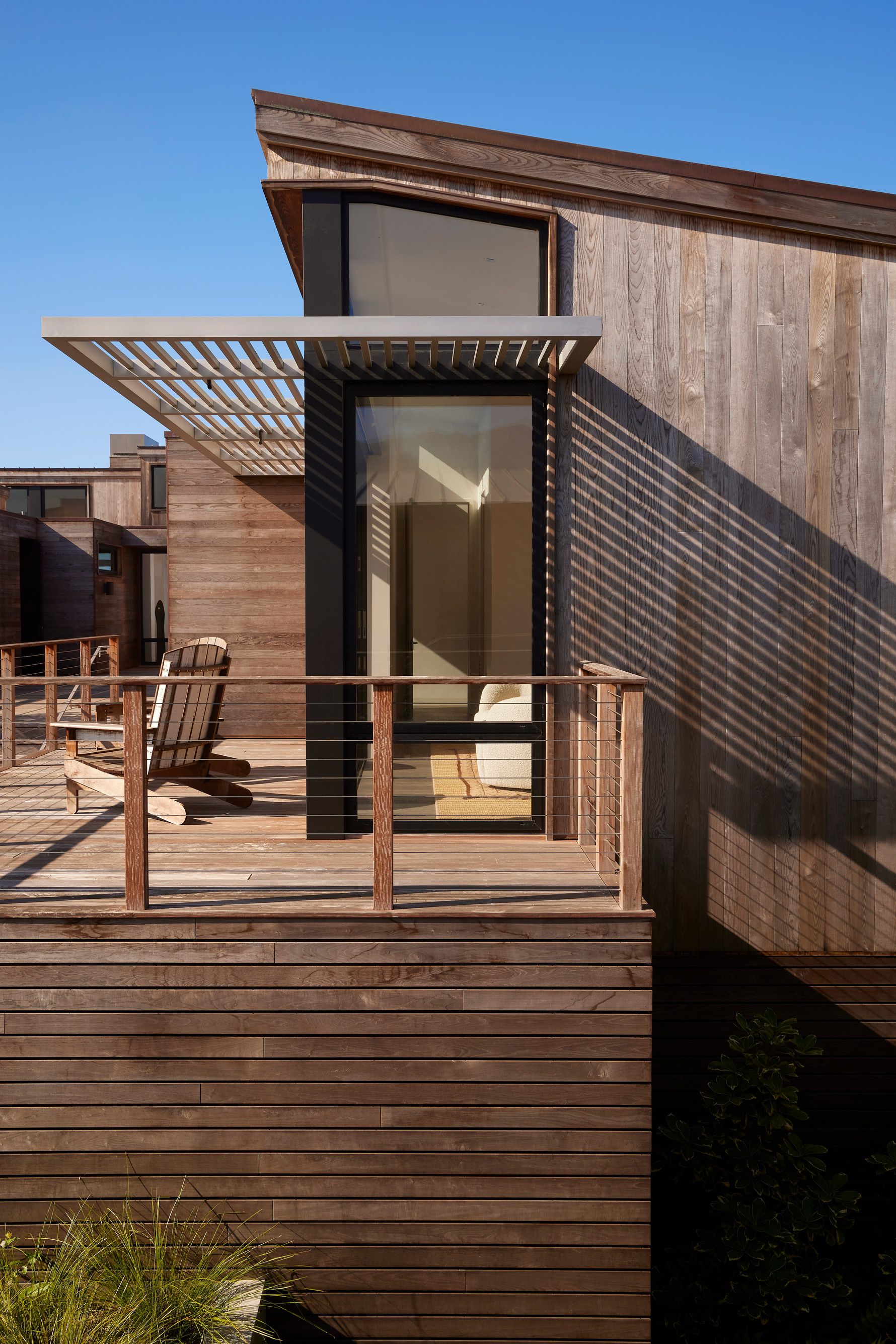 El-Estero-Beach-House-Wood-Siding-Metal-Trellis